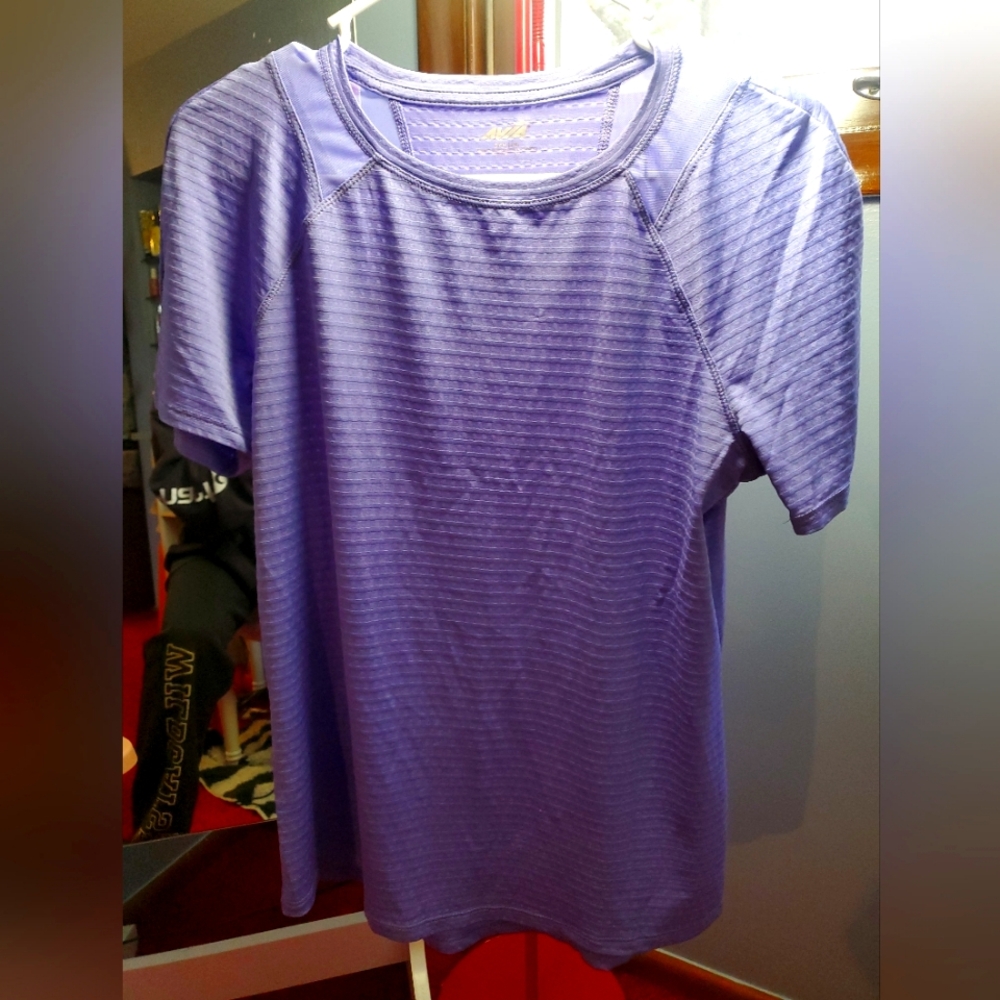 Purple Avia athletic tee. Size small but fits like a medium. Lightweight.